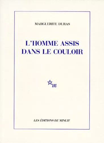 L'homme Assis Dans Le Couloir